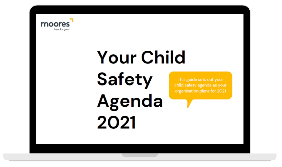 Laptop screen with text "Your Child Safety Agenda 2021"